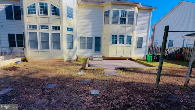 rear view of property featuring a patio area