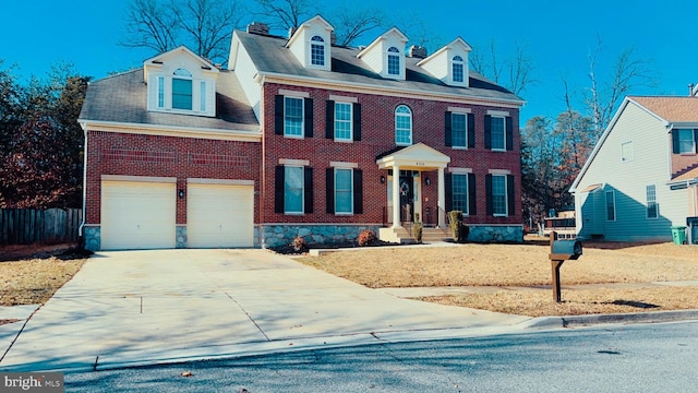 colonial inspired home with a garage