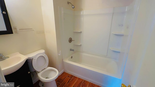 full bathroom featuring vanity, shower / washtub combination, and toilet