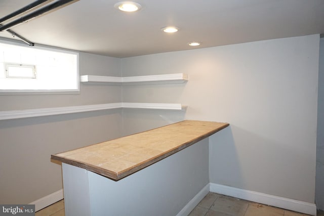 kitchen featuring light tile patterned flooring