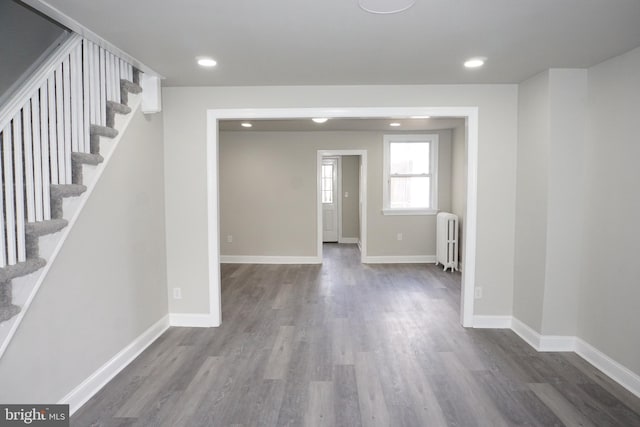 interior space featuring radiator and dark wood-type flooring