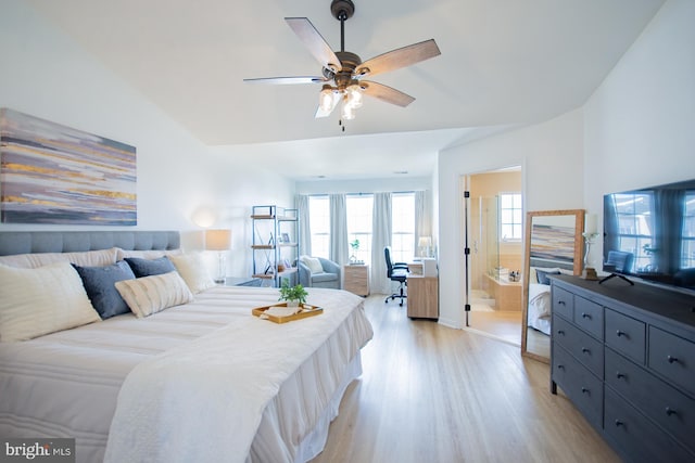 bedroom with ceiling fan, light hardwood / wood-style floors, and ensuite bath