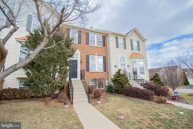 view of property with a front lawn