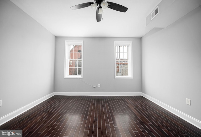 spare room featuring hardwood / wood-style flooring and ceiling fan