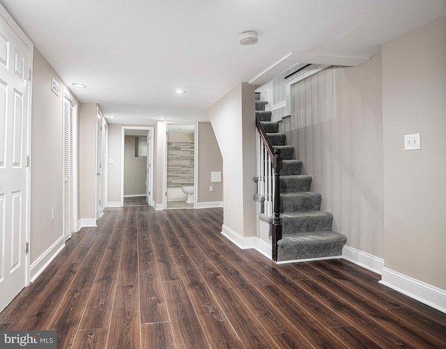 interior space with dark wood-type flooring