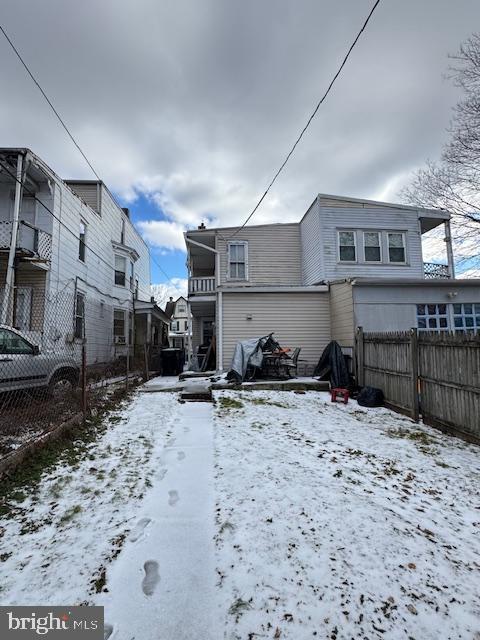 view of snow covered house