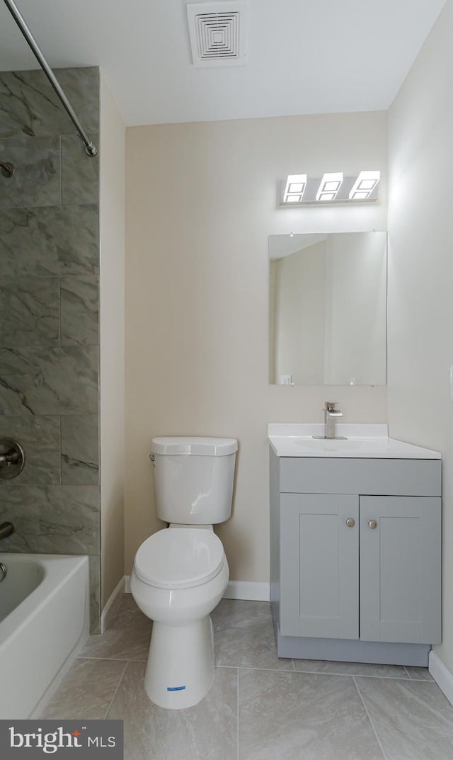 bathroom with visible vents, baseboards, toilet, vanity, and  shower combination