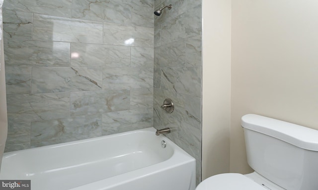 full bathroom with toilet and  shower combination