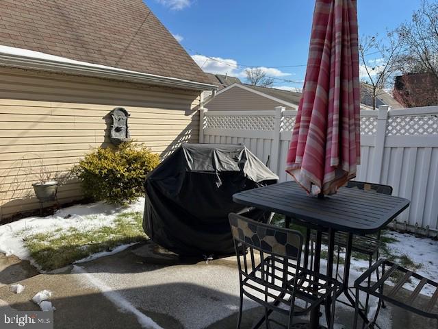 view of patio featuring a grill