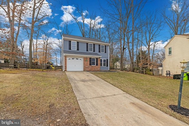 view of front facade featuring a garage and a front yard