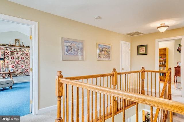 hallway featuring carpet floors