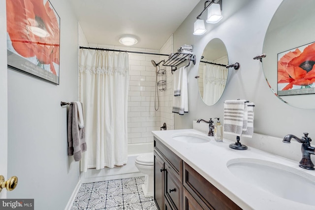 full bathroom featuring vanity, shower / bath combination with curtain, tile patterned floors, and toilet