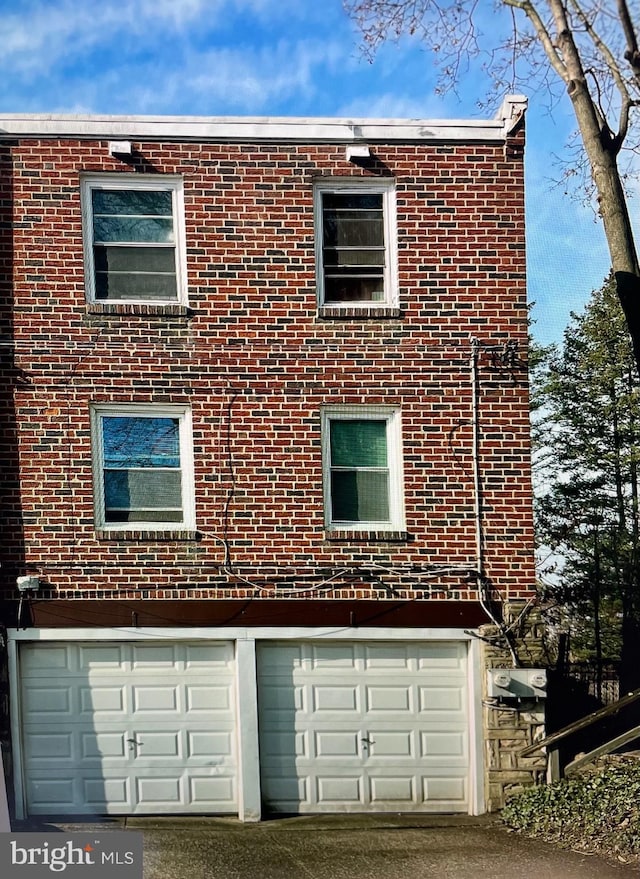 exterior space featuring a garage