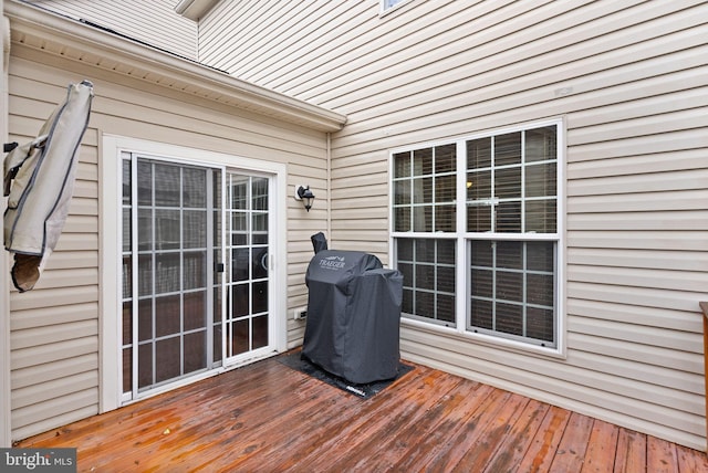 wooden terrace with grilling area