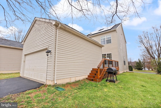 view of property exterior with a lawn