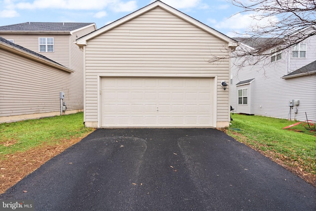 garage with a yard