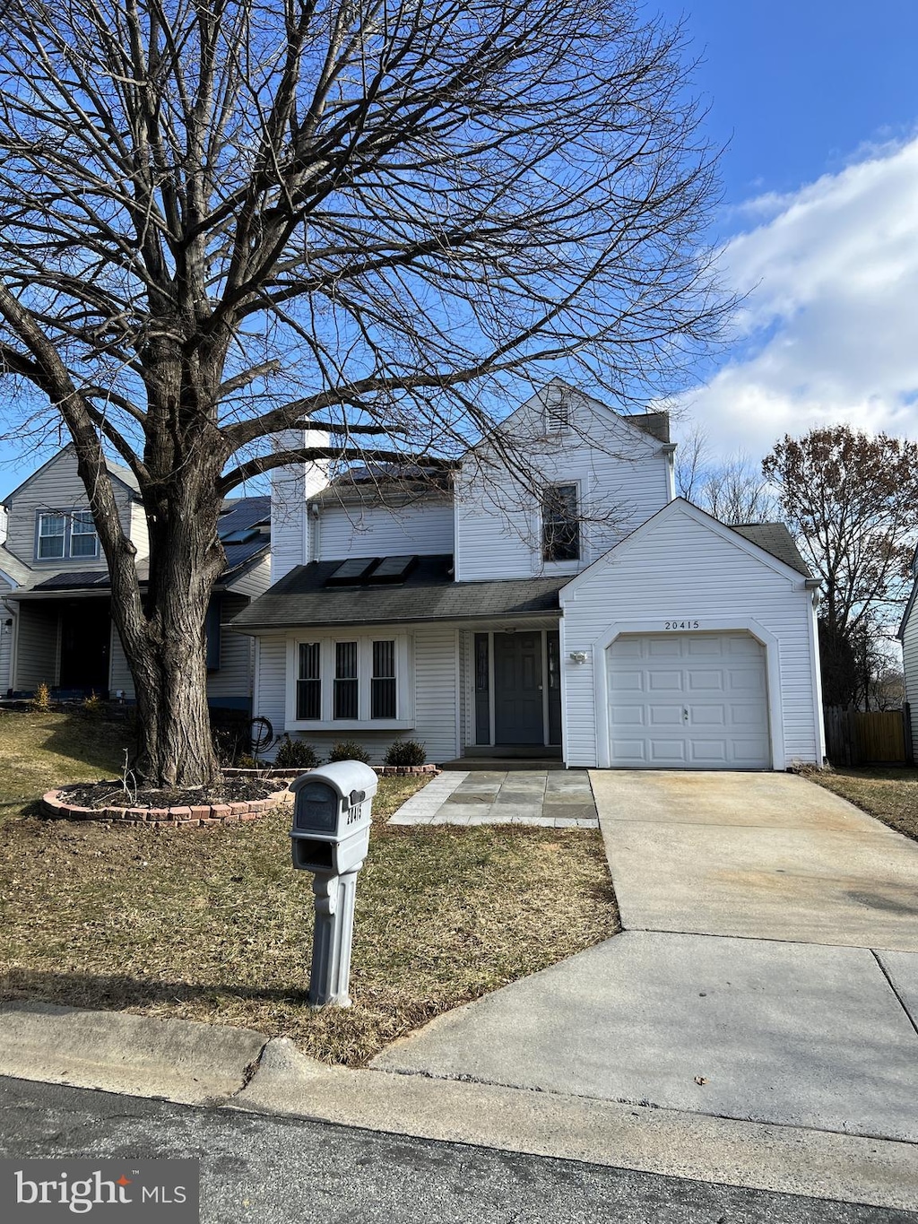 front facade with a garage