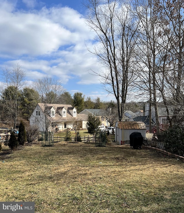 view of yard with a storage shed