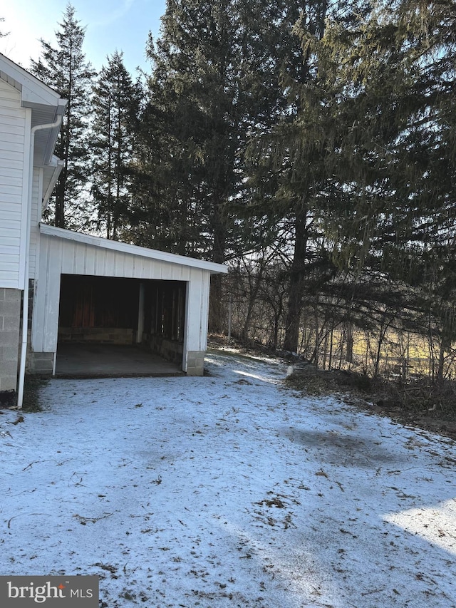 view of yard covered in snow