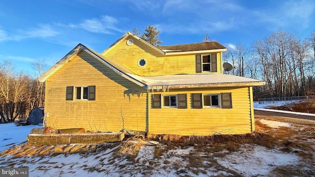 view of snow covered property