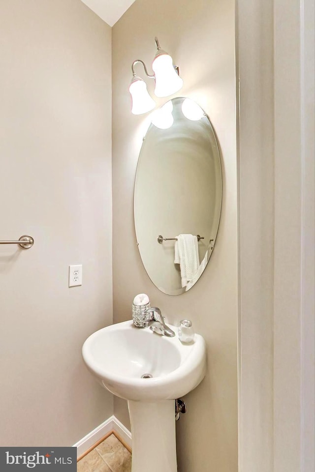 bathroom with tile patterned flooring