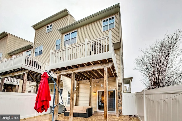 back of house featuring a patio area