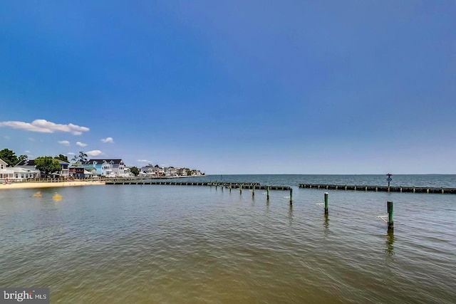 property view of water featuring a dock