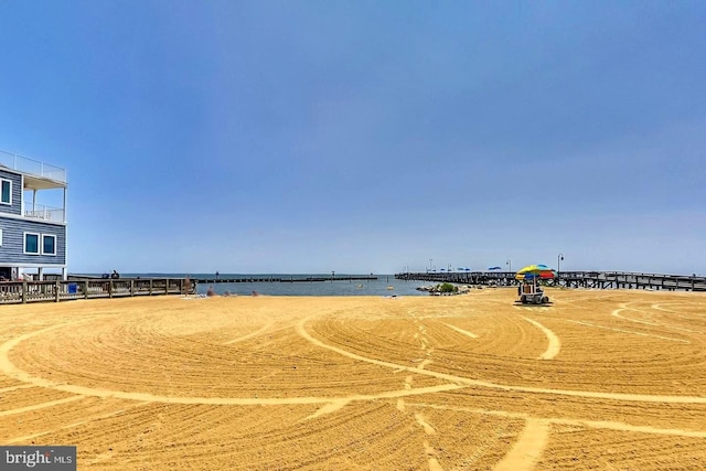 view of home's community with a water view