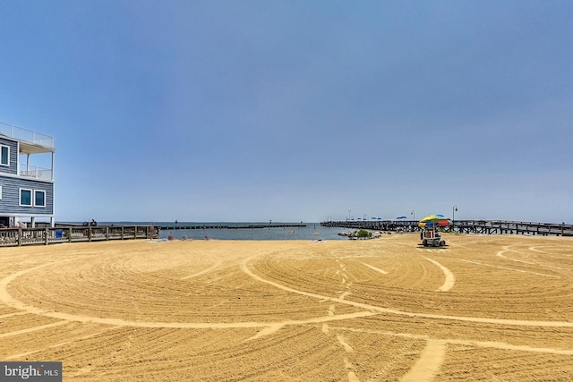 view of home's community with a water view