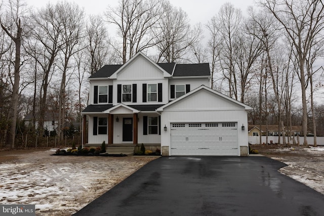 view of front of house with driveway and an attached garage