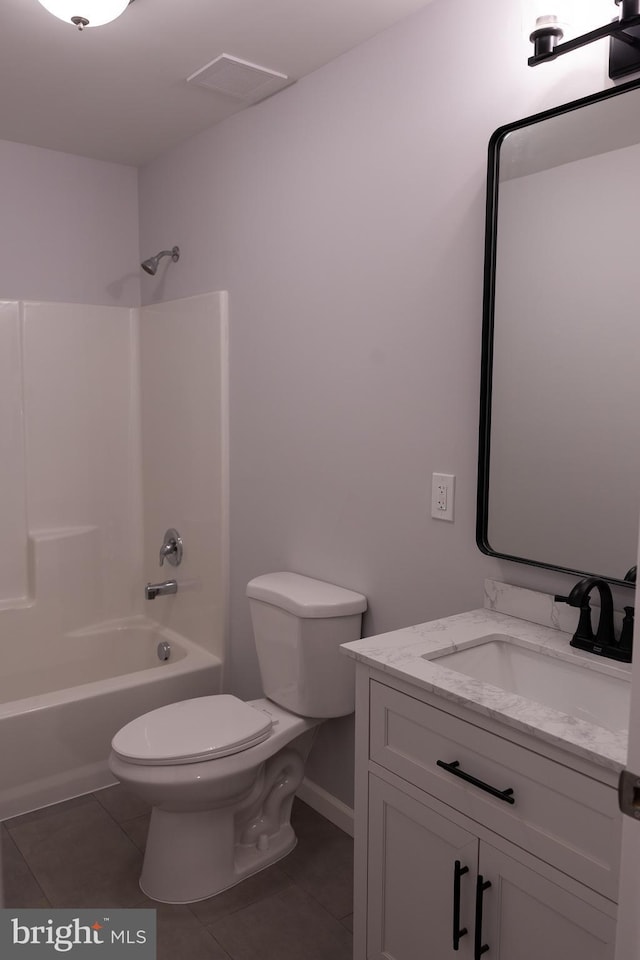 full bath featuring visible vents, toilet, tub / shower combination, vanity, and tile patterned floors