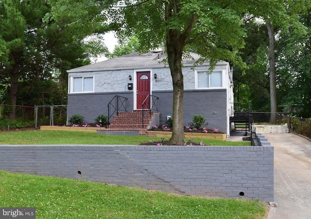 view of front of house with a front yard