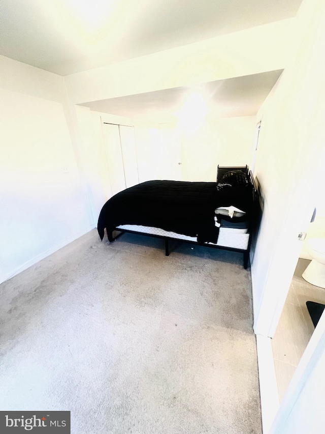 interior space featuring baseboards