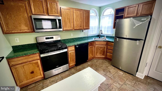 kitchen featuring stainless steel appliances and sink