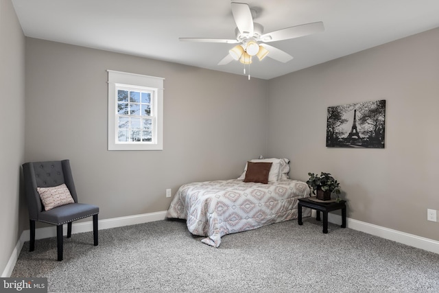 bedroom with ceiling fan and carpet