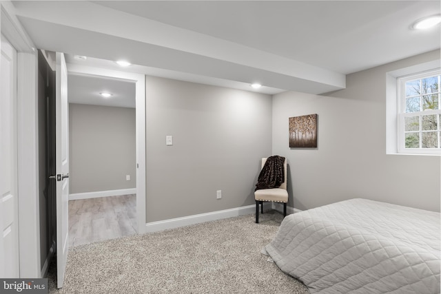 bedroom with light carpet