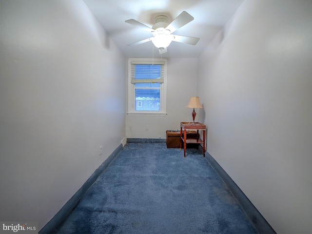 interior space with ceiling fan