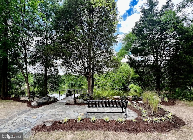 view of property's community featuring a patio