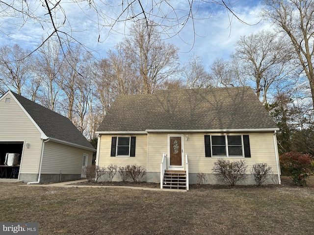 view of front of house with a front lawn