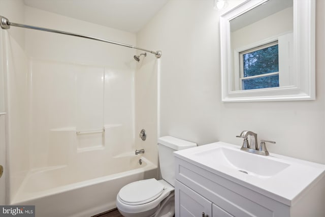 full bathroom featuring vanity, shower / washtub combination, and toilet