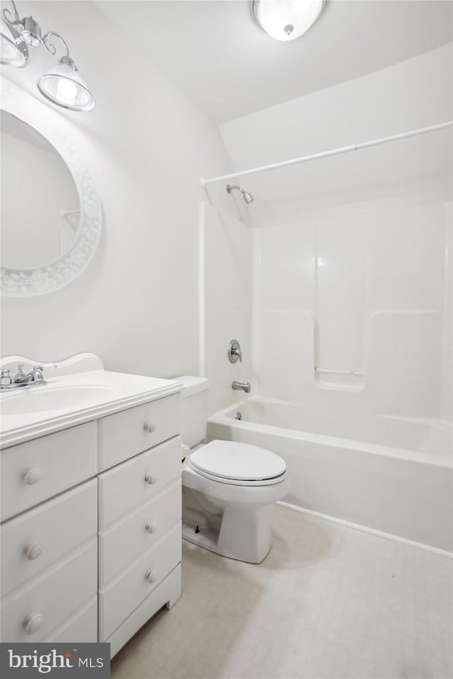 full bathroom with toilet, vanity, and shower / bathing tub combination