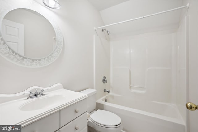 full bathroom with washtub / shower combination, vanity, and toilet