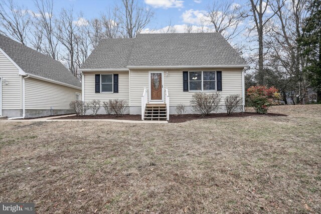 view of front of property featuring a front lawn