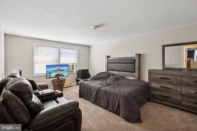 bedroom with light colored carpet