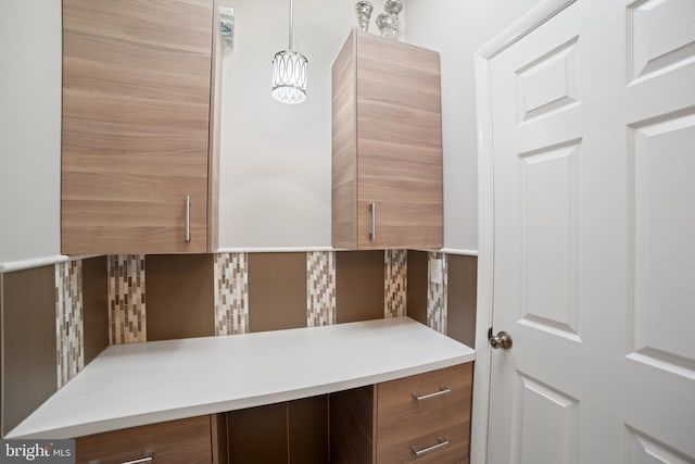 bathroom with tasteful backsplash