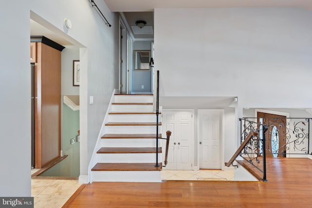 stairway featuring hardwood / wood-style floors