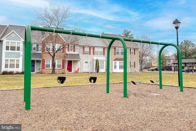 view of play area with a yard