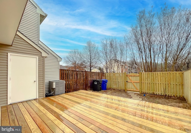 wooden deck with central air condition unit