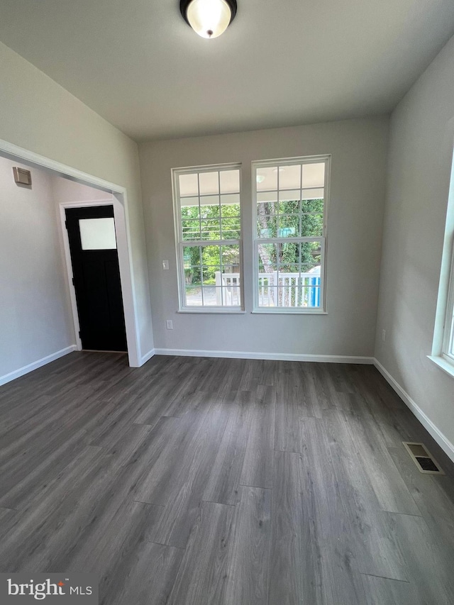 interior space with dark hardwood / wood-style flooring