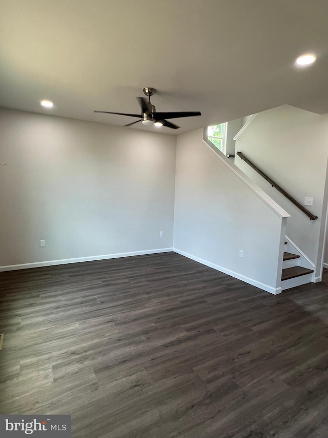 interior space featuring dark hardwood / wood-style flooring and ceiling fan